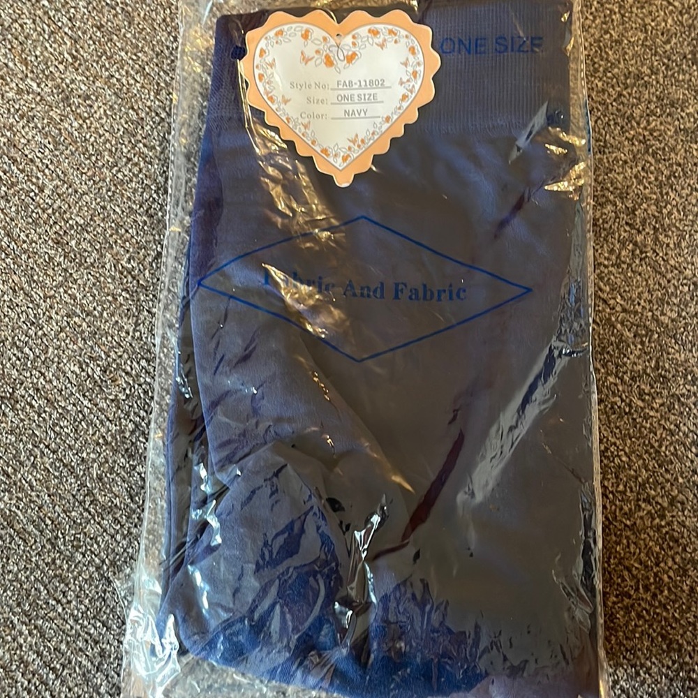 Fabric and Fabric. Navy leggings. Brand new with tags. One size fits all.